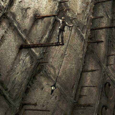 Figure detail from PENDULUM featuring a man precariously balanced on metal jutting from the side of a stone wall as he looks down. Light illuminates him along his left side as he reaches out and up to steady himself on a shorter length of rebar protruding from the wall. A chain wraps his other arm extended. The length of chain falls taut with the weight of a lantern hanging low like a pendulum.